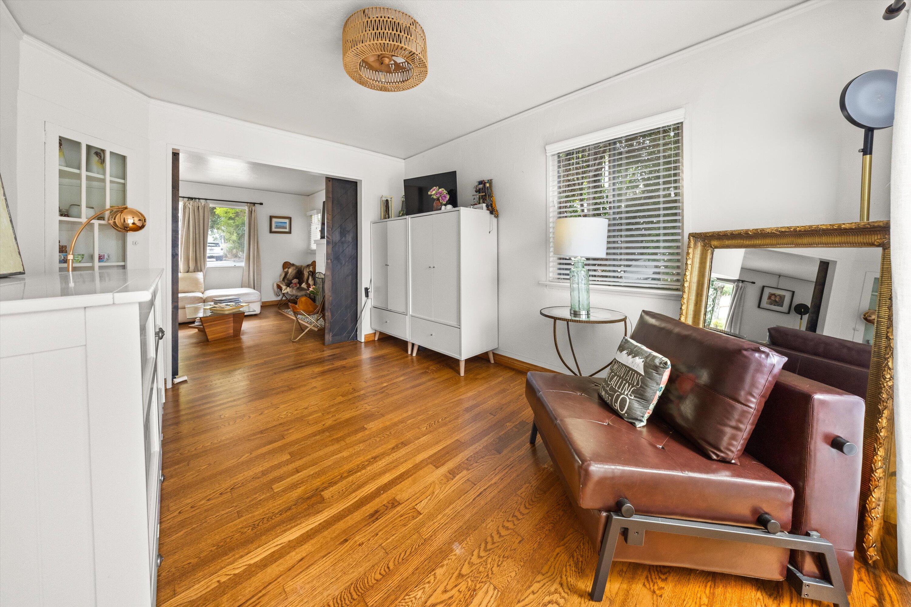 424 East Arrellaga Street Santa Barbara, CA 93101 - Photo 10 of 32 a living room with furniture and a fireplace