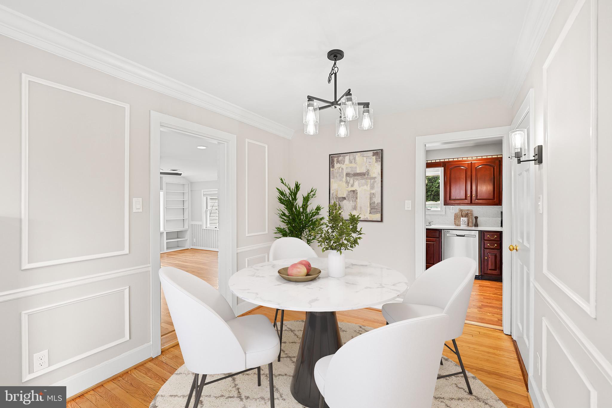 1600 Oaklawn Court Silver Spring, MD 20903 - Photo 15 of 62 a view of a dining room with furniture window and wooden floor
