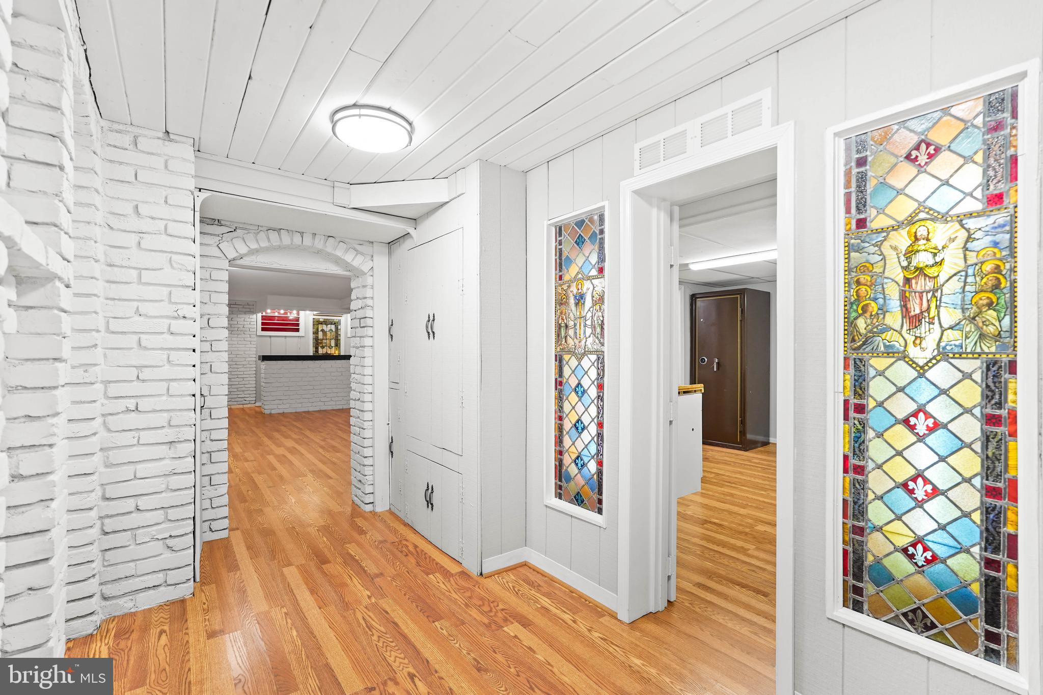 1600 Oaklawn Court Silver Spring, MD 20903 - Photo 53 of 62 a view of a hallway with wooden floor and front door