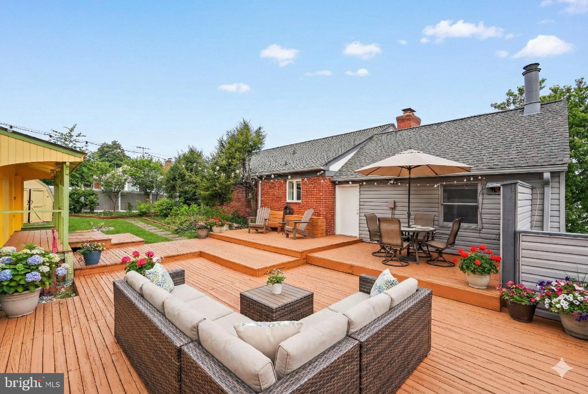 1600 Oaklawn Court Silver Spring, MD 20903 - Photo 55 of 62 a view of a house with swimming pool and sitting area