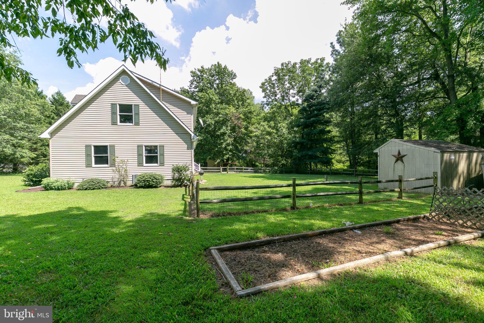 215 Roe Road Barclay, MD 21607 - Photo 2 of 49 A gardener's haven.