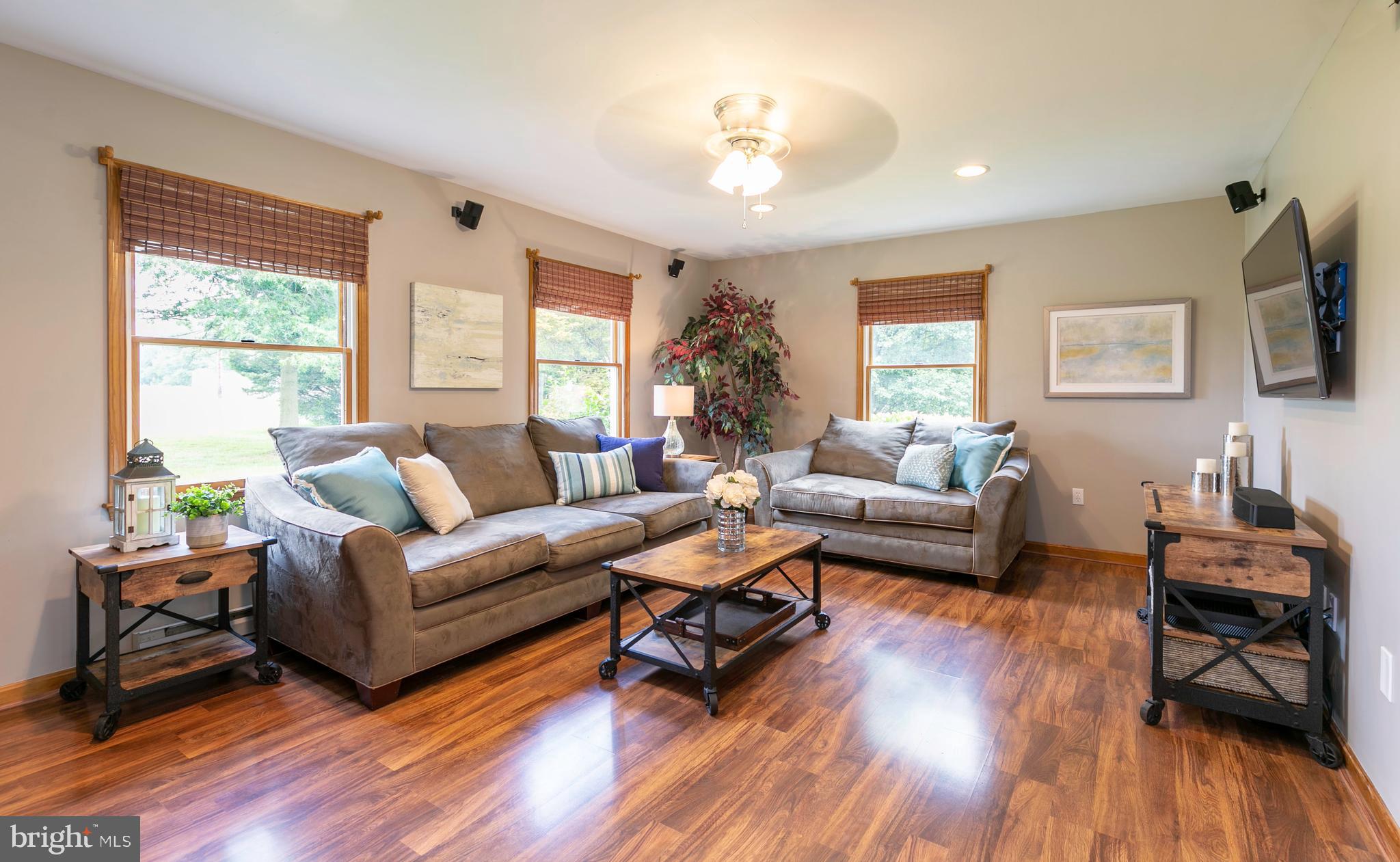 215 Roe Road Barclay, MD 21607 - Photo 4 of 49 3 large windows filled the living room with light.