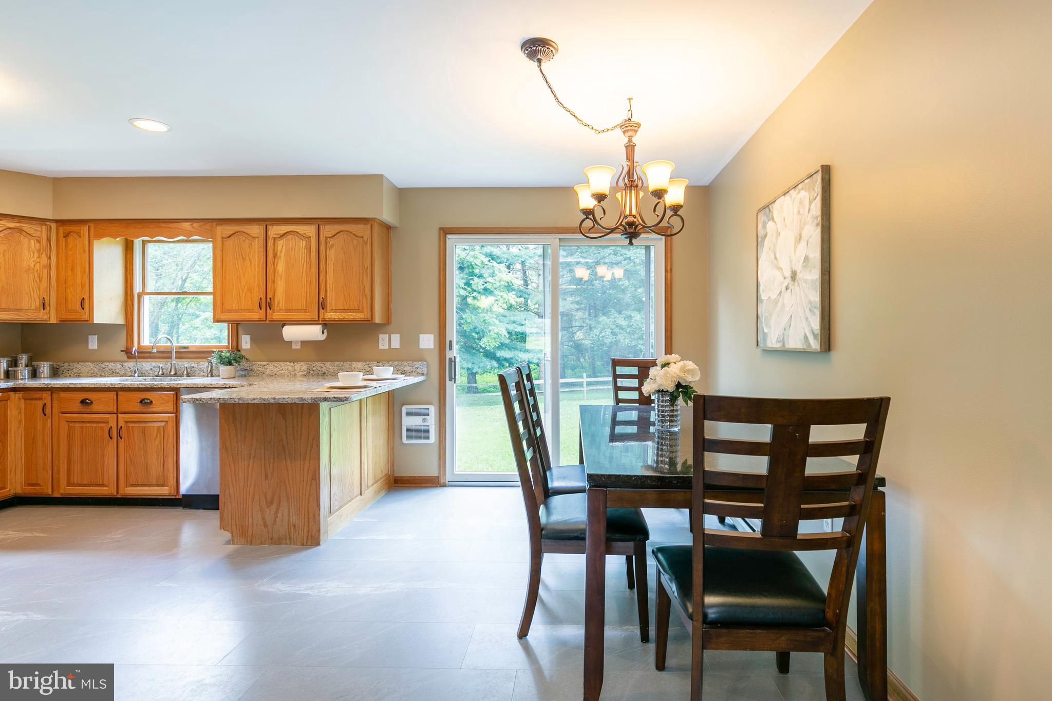 215 Roe Road Barclay, MD 21607 - Photo 34 of 49 Kitchen/dining area combo with access to the back.