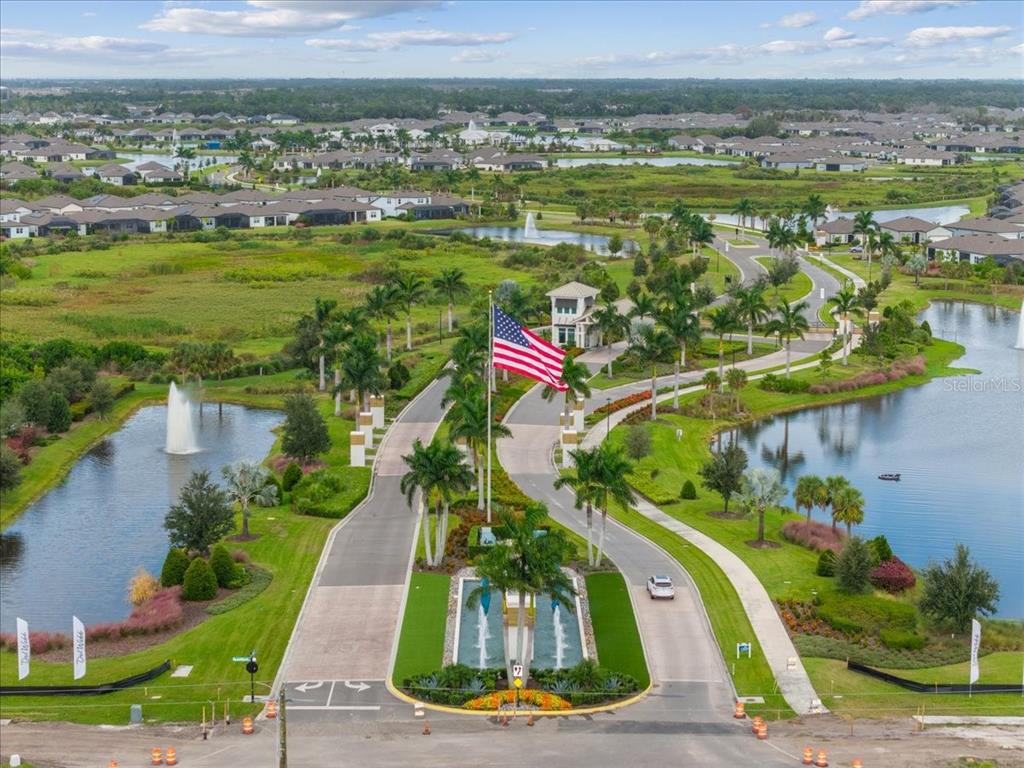 9434 Ballaster Pointe Loop Palmetto, FL 34221 - Photo 47 of 66 a view of outdoor space swimming pool and lake view