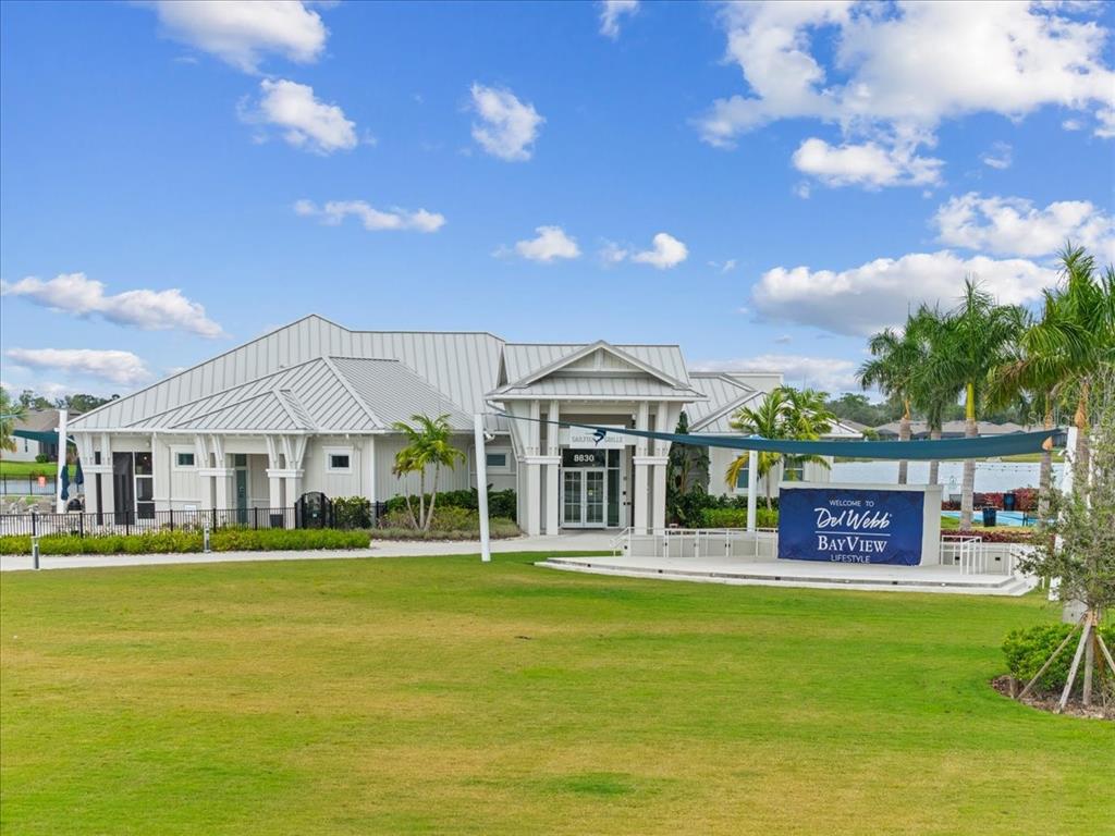9434 Ballaster Pointe Loop Palmetto, FL 34221 - Photo 48 of 66 a view of a house with a swimming pool