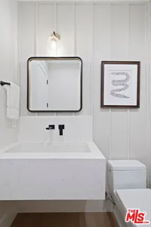 a bathroom with a bathtub and a toilet