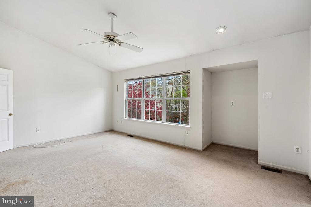 5235 Lightfoot Path Columbia, MD 21044 - Photo 15 of 32 an empty room with a window