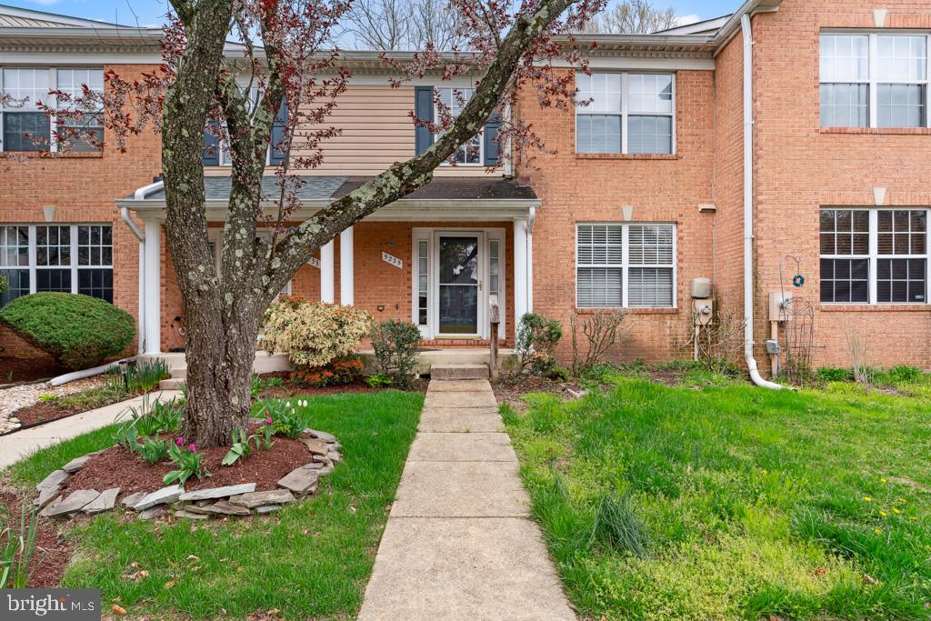 5235 Lightfoot Path Columbia, MD 21044 - Photo 2 of 32 a front view of a house with garden