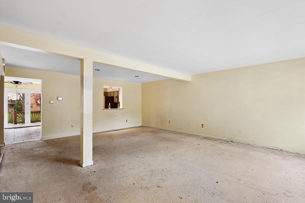 5235 Lightfoot Path Columbia, MD 21044 - Photo 21 of 32 an empty room with windows