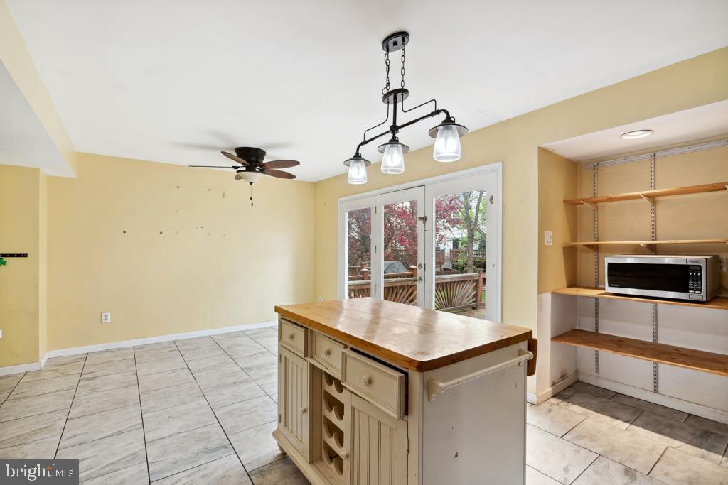 5235 Lightfoot Path Columbia, MD 21044 - Photo 8 of 32 a view of a kitchen with a sink and microwave