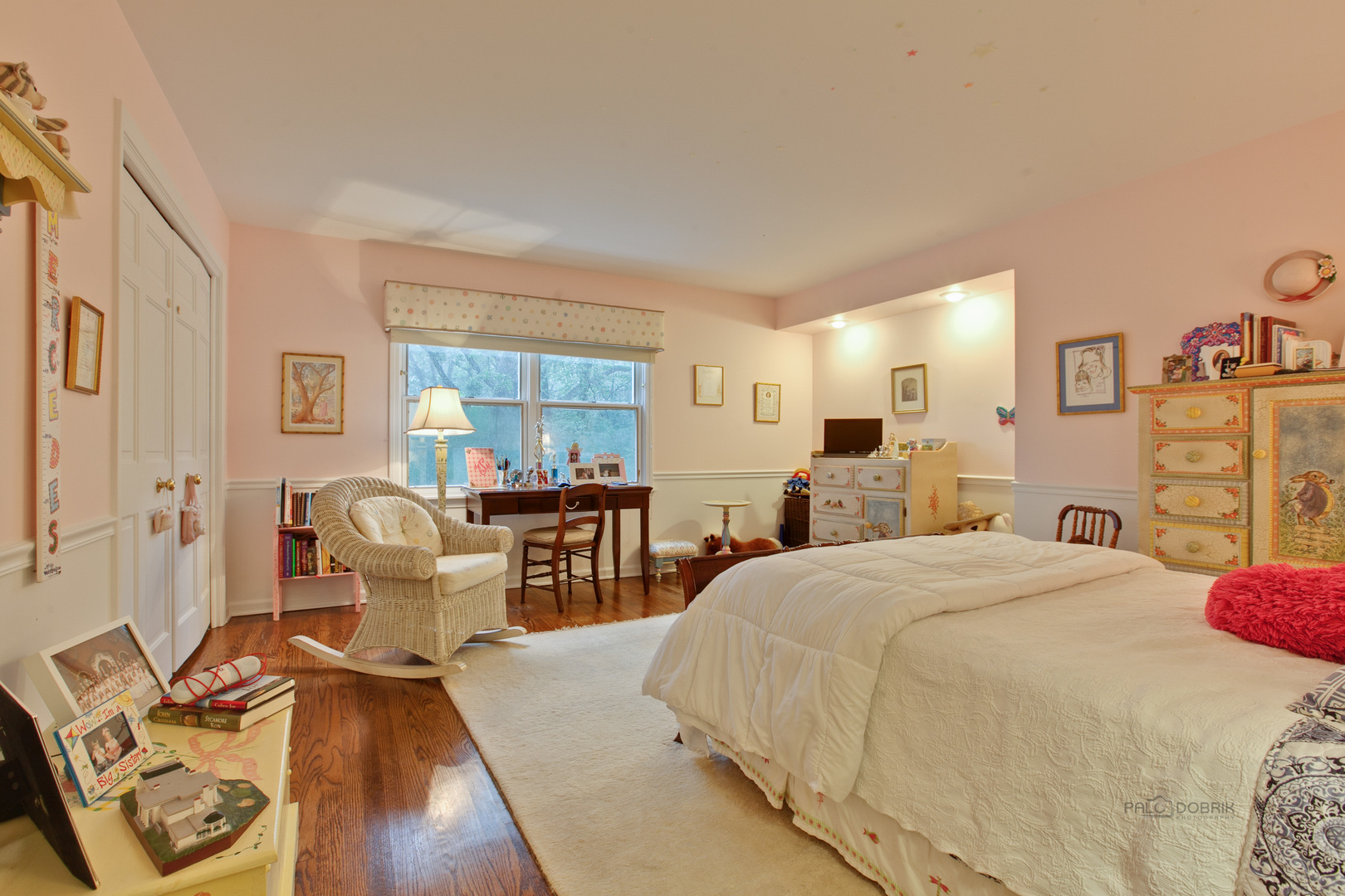 485 Rockefeller Road Lake Forest, IL 60045 - Photo 15 of 21 a bedroom with a bed and wooden floor