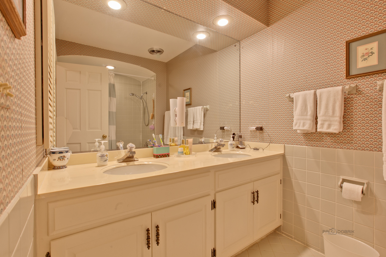 485 Rockefeller Road Lake Forest, IL 60045 - Photo 16 of 21 a bathroom with double sink and a mirror