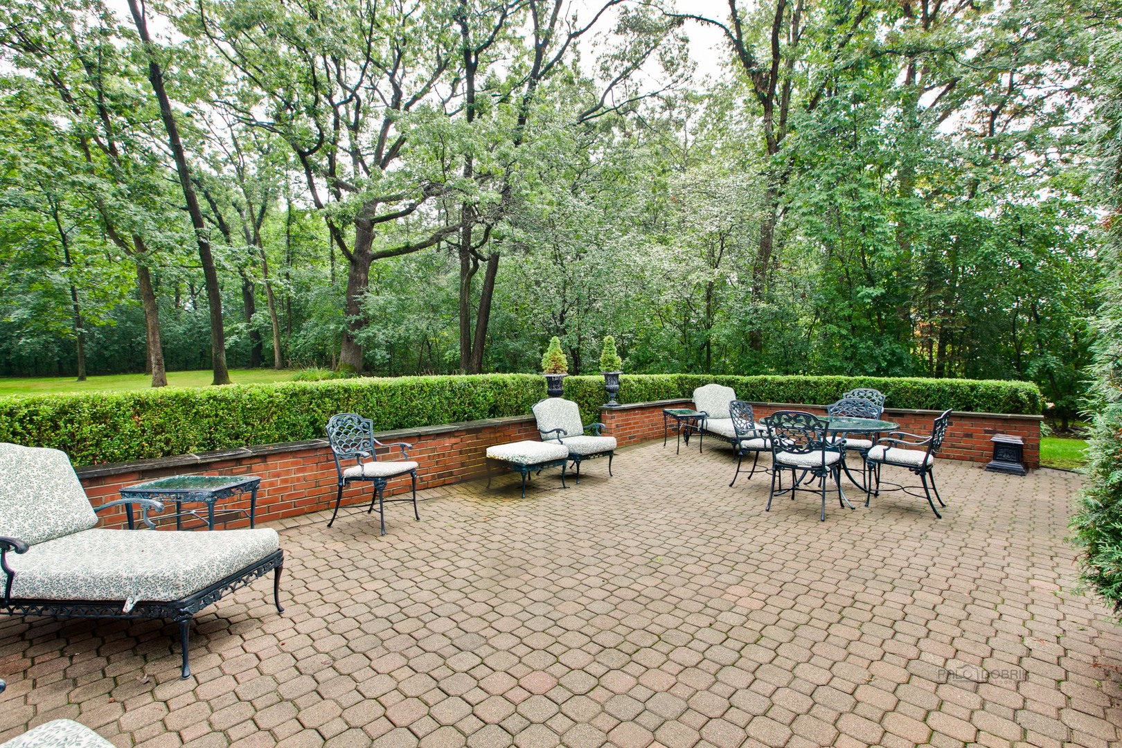 485 Rockefeller Road Lake Forest, IL 60045 - Photo 18 of 21 a view of a patio with chairs and a table