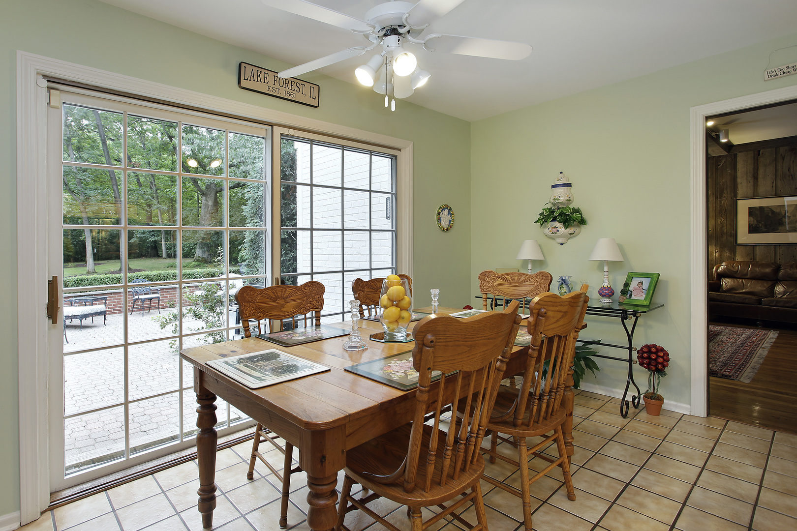 485 Rockefeller Road Lake Forest, IL 60045 - Photo 10 of 21 a view of a dining room with furniture window and outside view