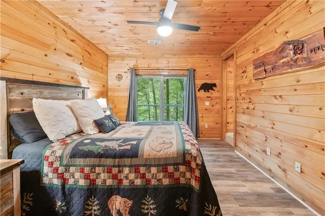 a view of a chairs and table in the balcony