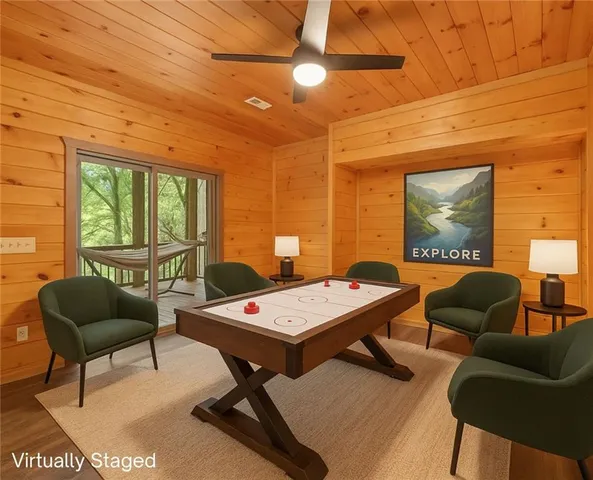 a spacious bedroom with a large bed and a dresser