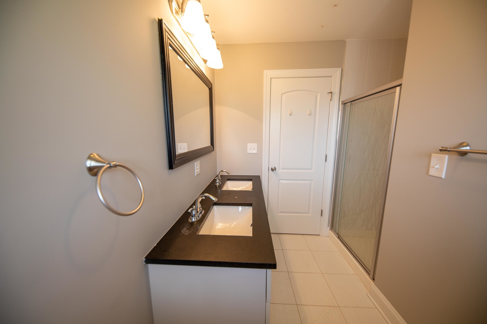 1722 East Aztec Lane Mount Prospect, IL 60056 - Photo 13 of 18 a room with wooden floor and mirror