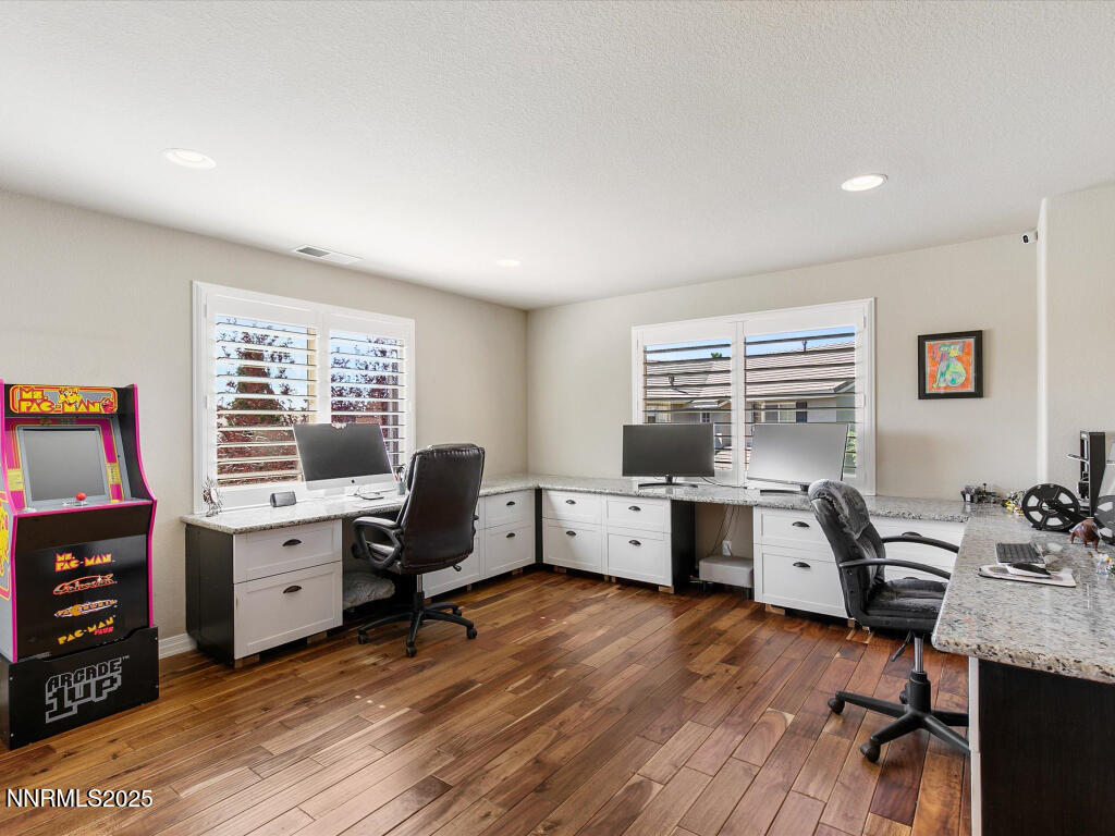 7284 Glenmore Court Reno, NV 89523 - Photo 12 of 28 a view of workspace with wooden floor and windows