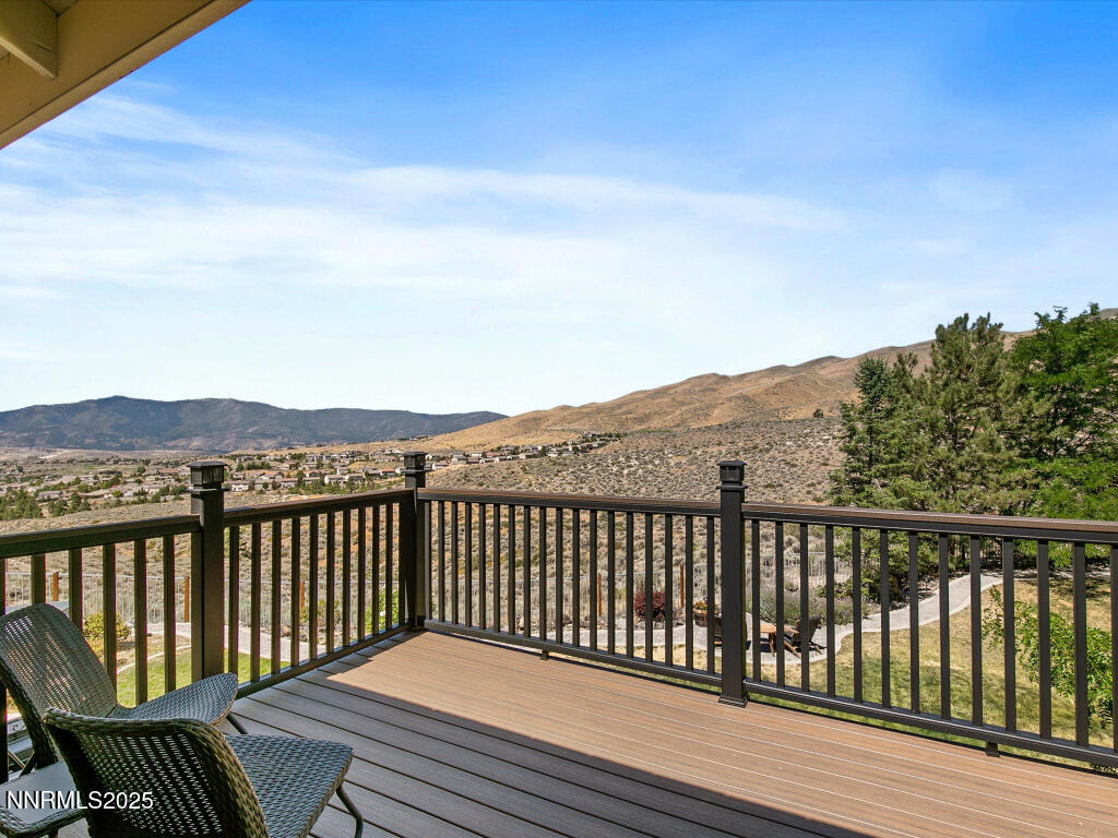 7284 Glenmore Court Reno, NV 89523 - Photo 24 of 28 a view of a wooden roof deck