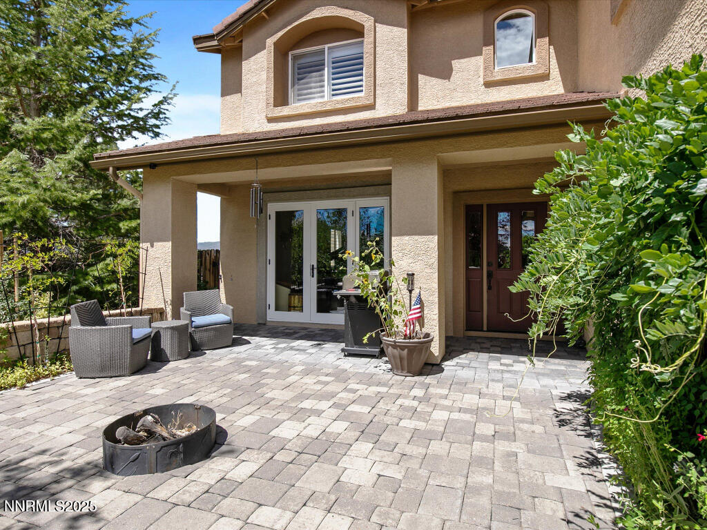 7284 Glenmore Court Reno, NV 89523 - Photo 9 of 28 a view of a house with backyard porch and sitting area