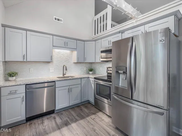a view of entryway with wooden floor