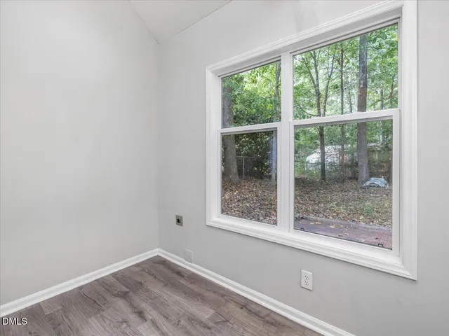 a kitchen with appliances and a microwave