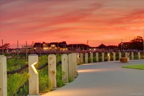 a view of a lake with a houses