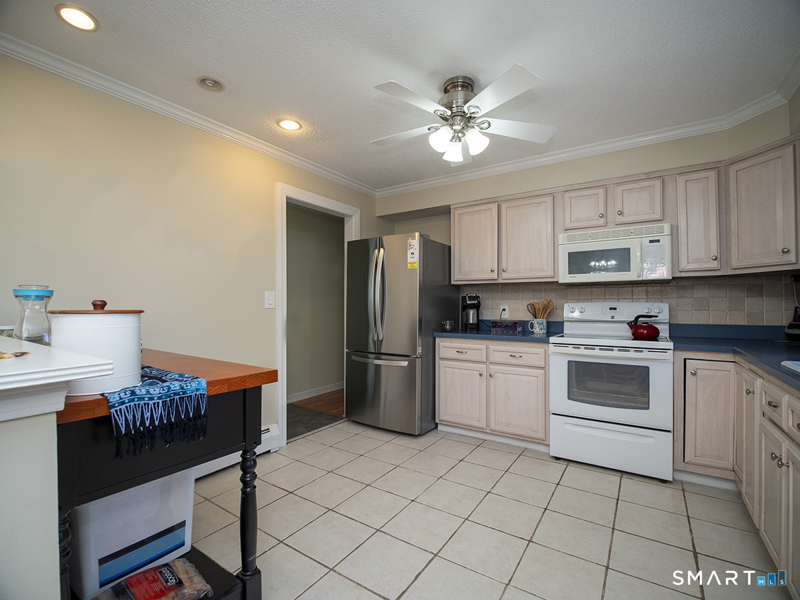 82 Wilcox Road Middletown, CT 06457 - Photo 20 of 27 a kitchen with a cabinets and appliances