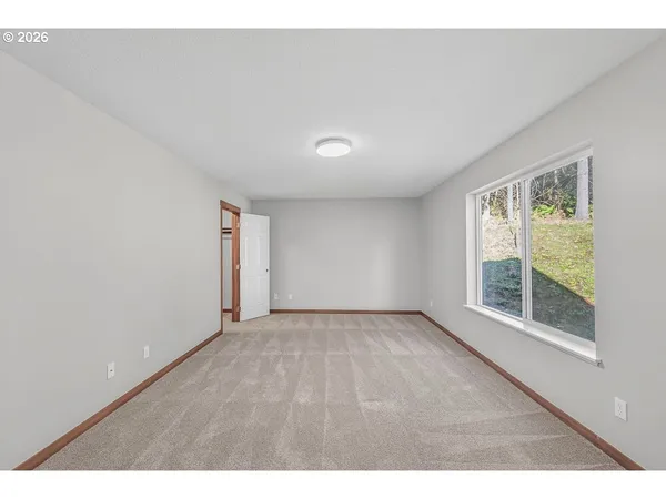 a view of an empty walk in closet