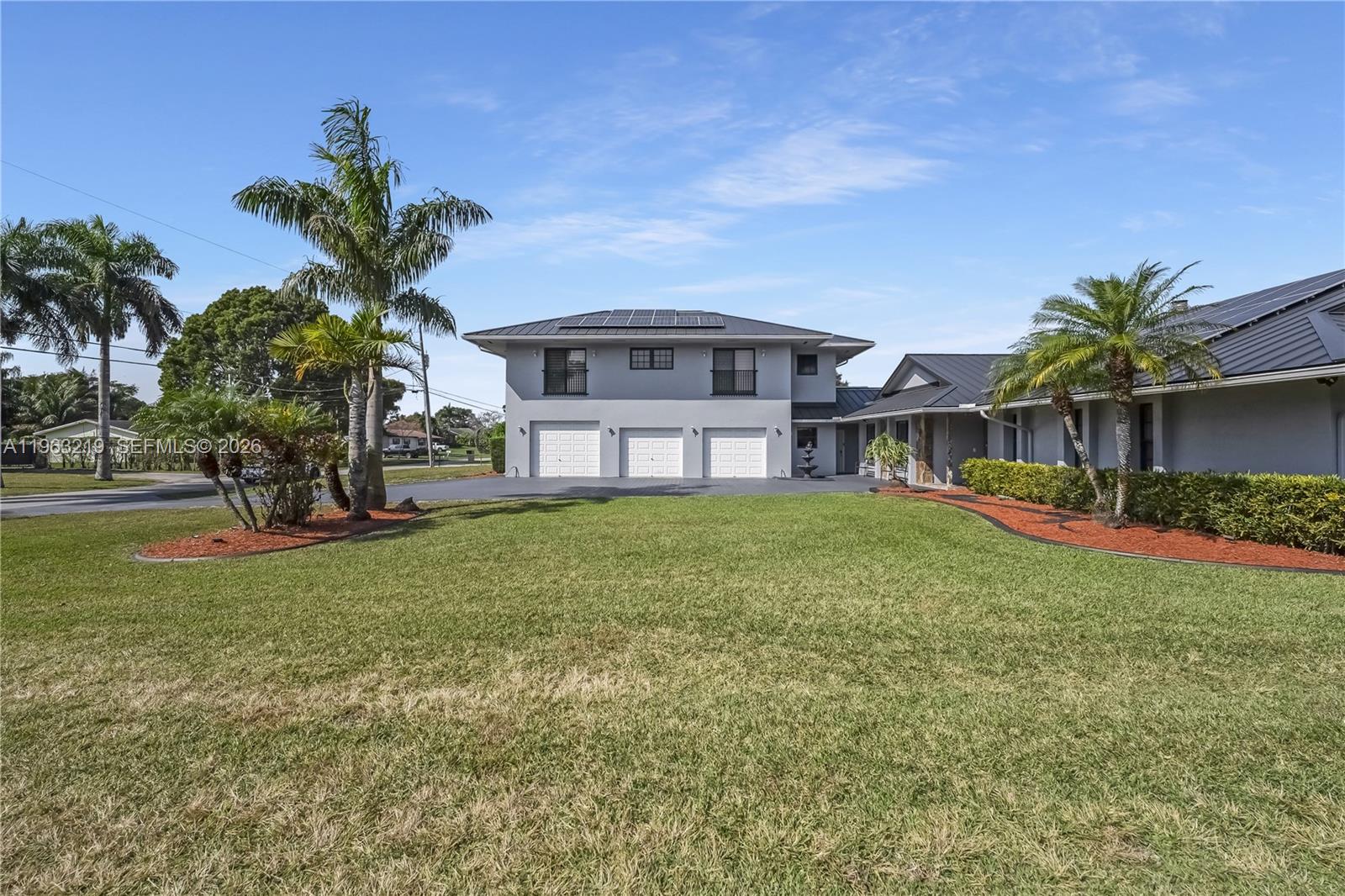 14651 Southwest 16th Street Davie, FL 33325 - Photo 11 of 52 a view of a house with a yard