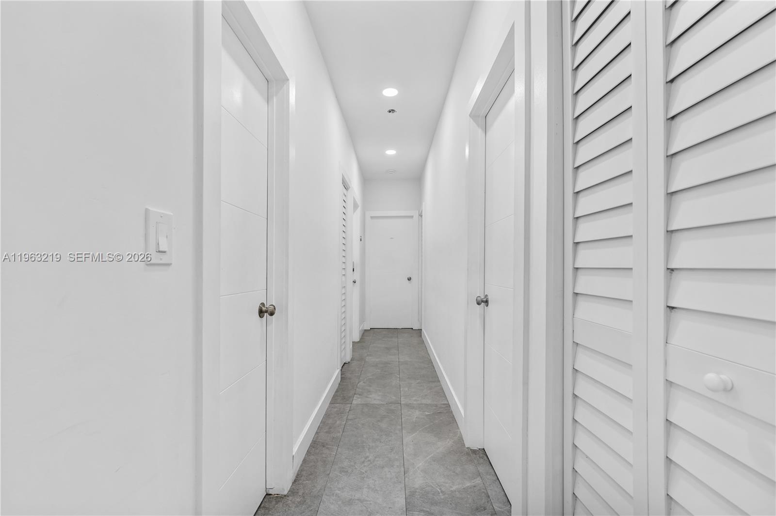 14651 Southwest 16th Street Davie, FL 33325 - Photo 33 of 52 a view of a hallway with wooden floor and entryway
