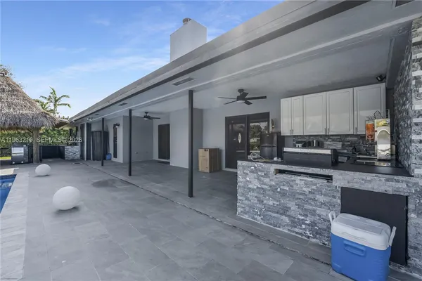 a view of living room and utility room