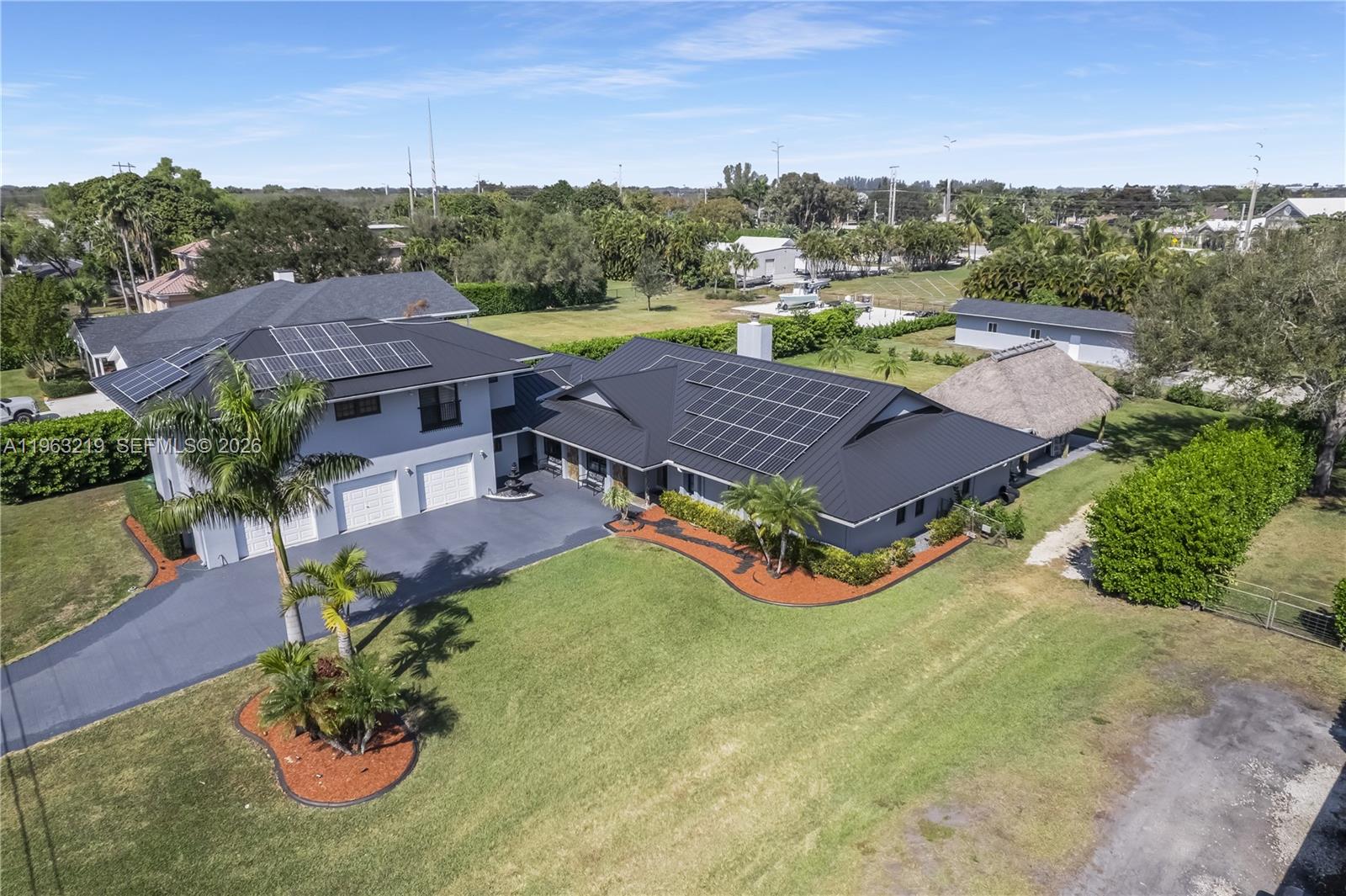 14651 Southwest 16th Street Davie, FL 33325 - Photo 5 of 52 an aerial view of residential houses with outdoor space and trees