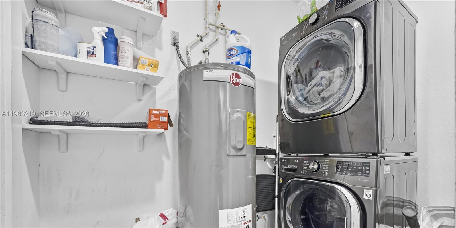 14651 Southwest 16th Street Davie, FL 33325 - Photo 51 of 52 a utility room with dryer and washer