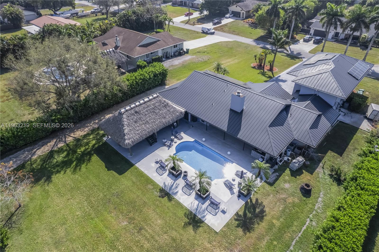 14651 Southwest 16th Street Davie, FL 33325 - Photo 7 of 52 an aerial view of house with yard swimming pool and outdoor seating