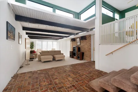 a bed room with a bed and a couch