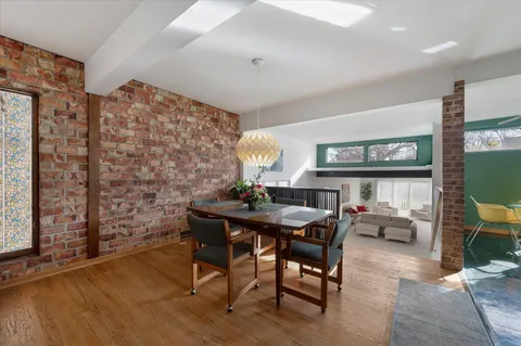 a view of a livingroom with furniture and window