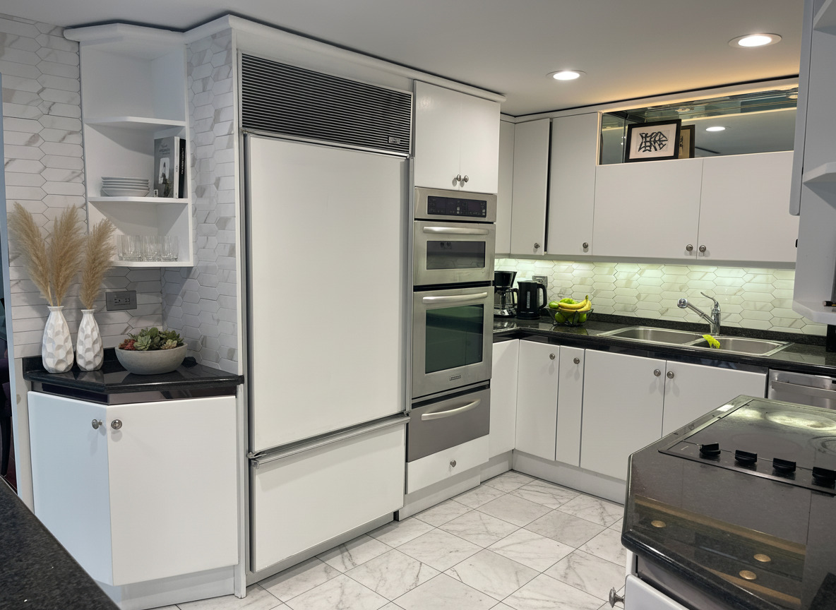 175 East Delaware Place, Unit 8604 Chicago, IL 60611 - Photo 12 of 28 a kitchen with stainless steel appliances a refrigerator sink and cabinets