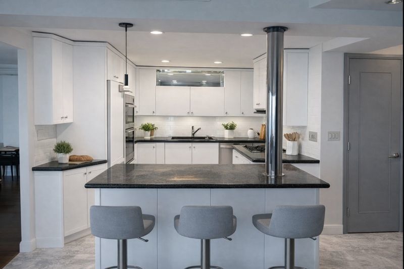 175 East Delaware Place, Unit 8604 Chicago, IL 60611 - Photo 14 of 28 a kitchen with stainless steel appliances granite countertop a kitchen sink and cabinets