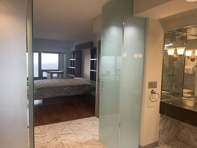 175 East Delaware Place, Unit 8604 Chicago, IL 60611 - Photo 23 of 31 a bathroom with a sink and a mirror