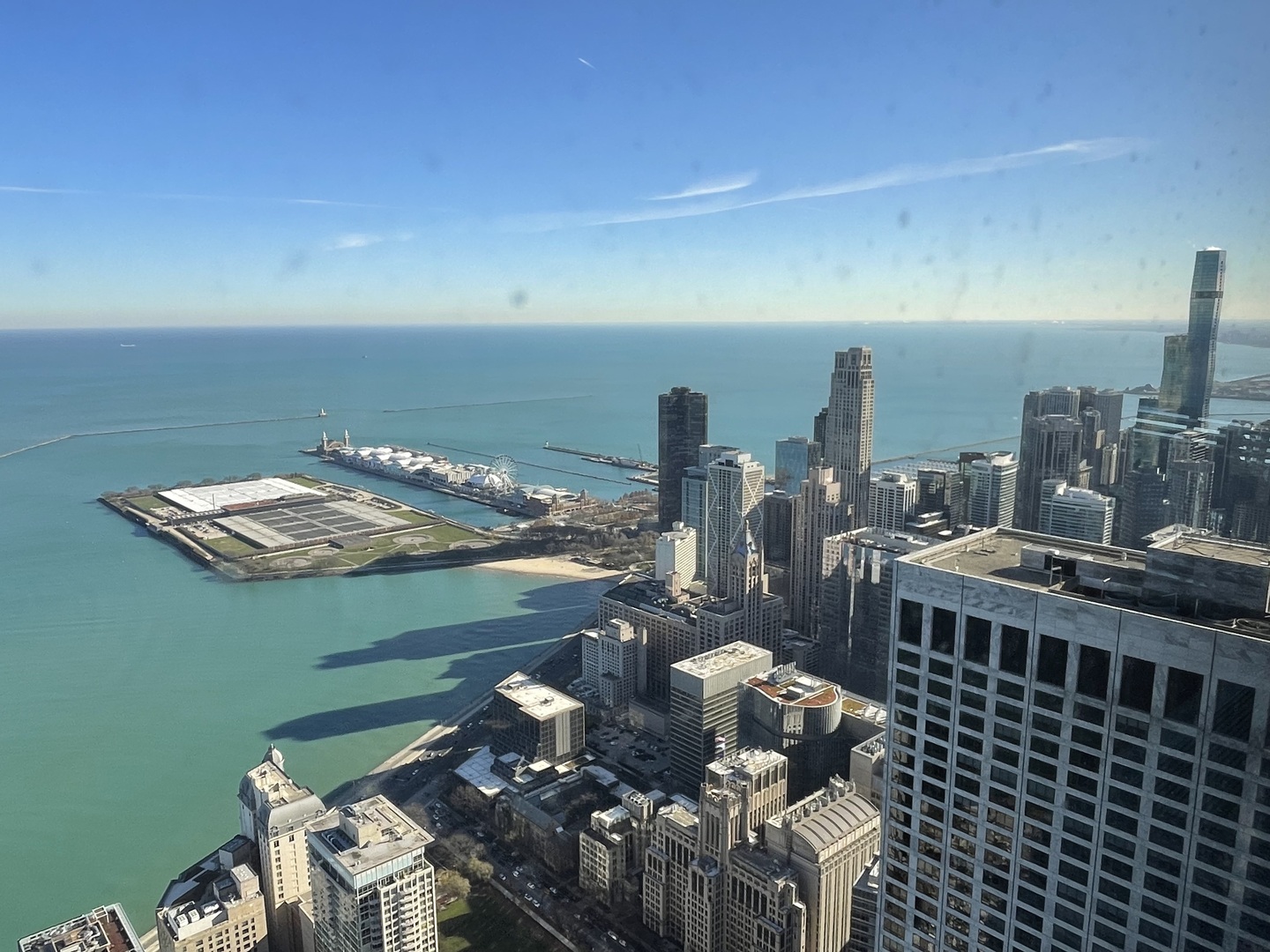 175 East Delaware Place, Unit 8604 Chicago, IL 60611 - Photo 7 of 28 a view of a balcony with dining table and chairs