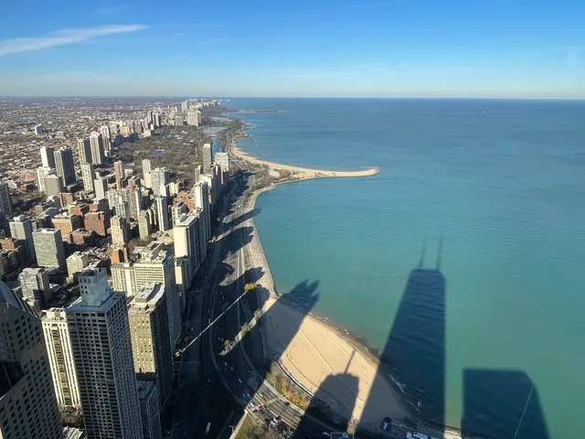 a view of a balcony with an ocean
