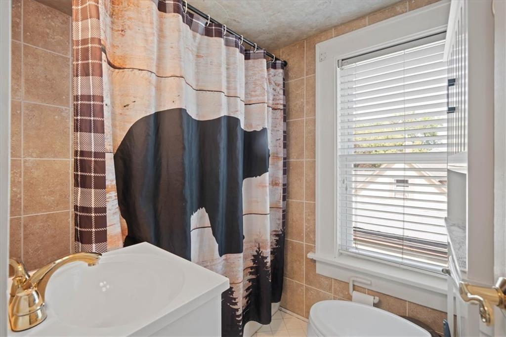 12910 Grandview Road Grandview, MO 64030 - Photo 27 of 39 Gallery Image 27
