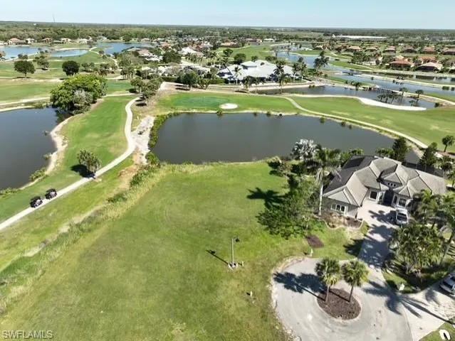 a view of a lake with a houses