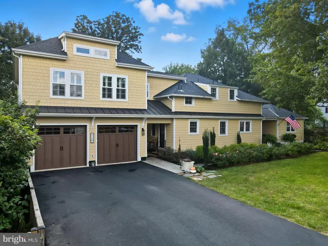 a view of house with yard outdoor seating and barbeque oven