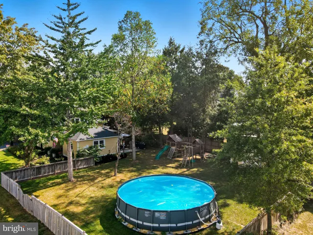 a kitchen with stainless steel appliances a sink stove and refrigerator