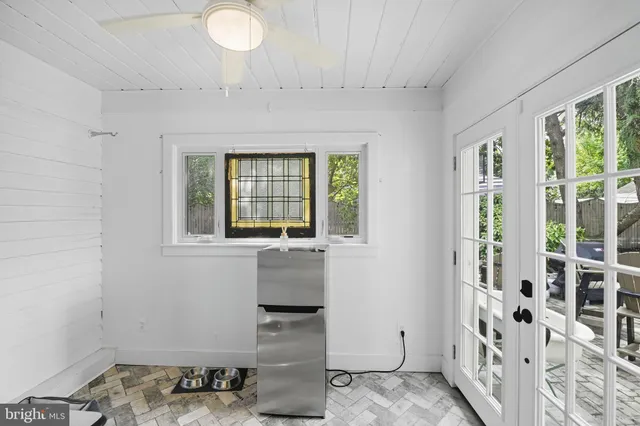 a bedroom with furniture and a bed