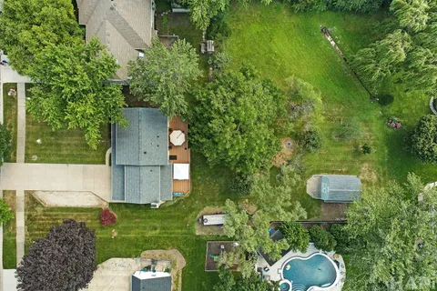 a backyard of a house with lots of green space