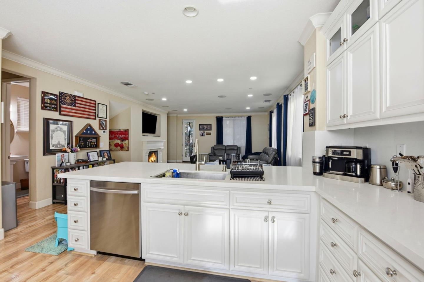 56 Regency Place Hayward, CA 94544 - Photo 14 of 43 a kitchen with white cabinets and sink
