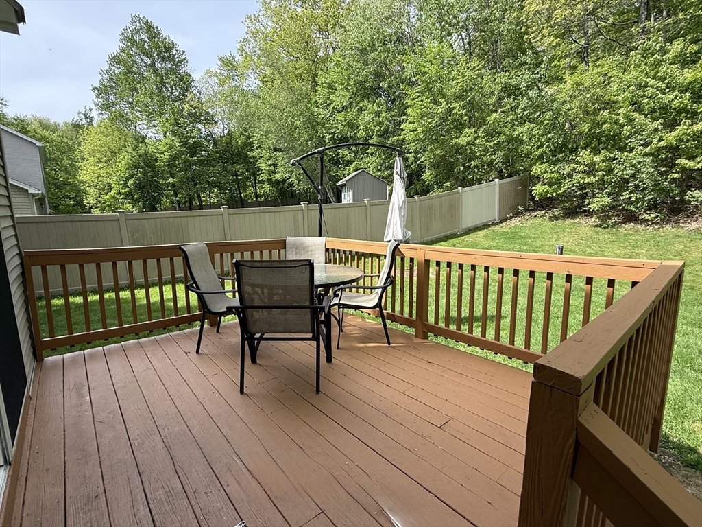 222 Bridge Street Warren, MA 01083 - Photo 38 of 40 a view of a wooden deck with furniture